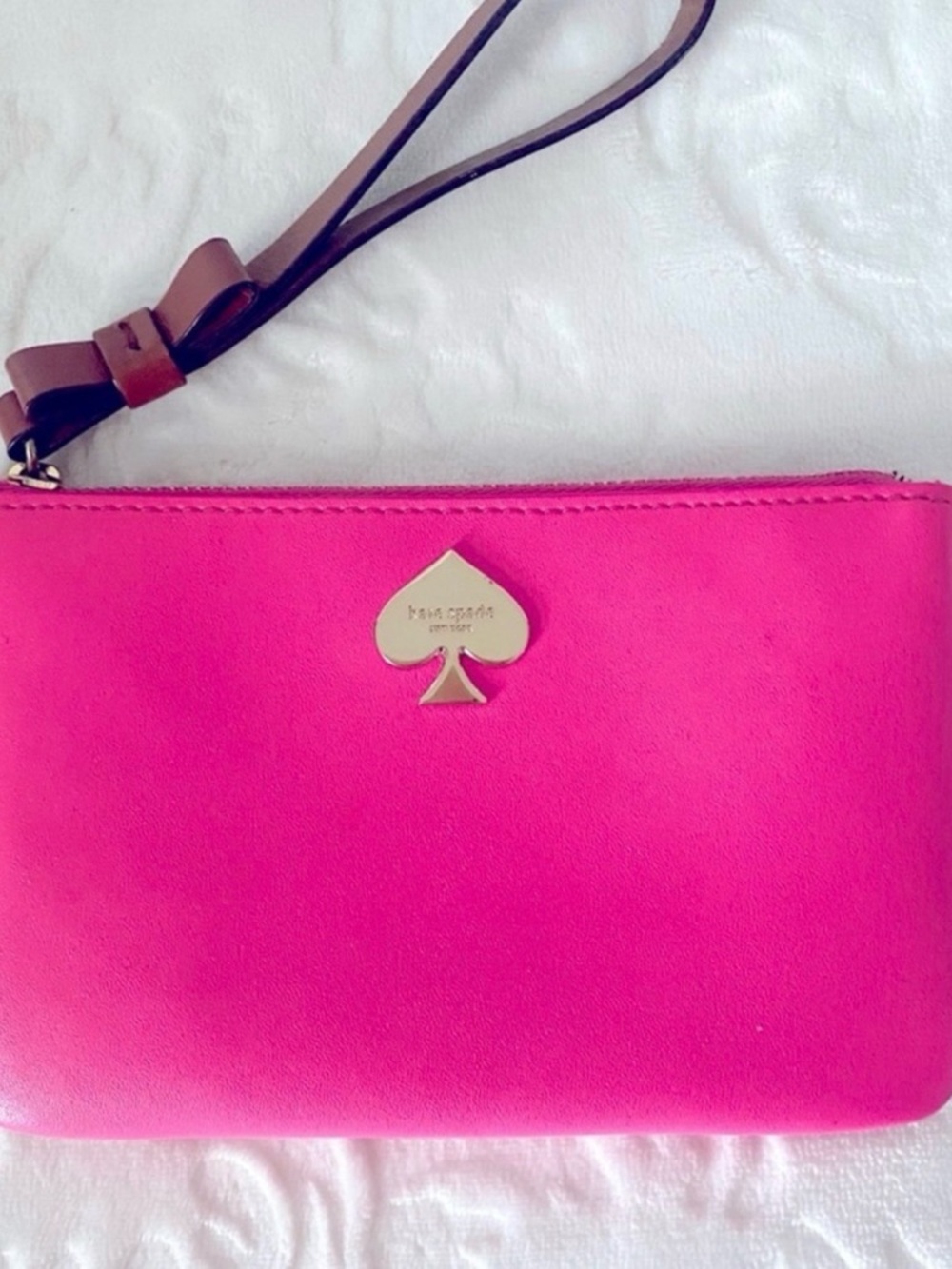 kate spade Hot Pink Wristlet with Brown Strap and Gold Logo